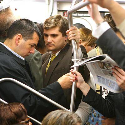 Пътници в метрото в Ню Йорк