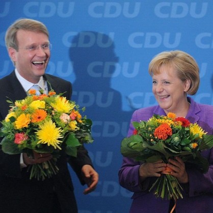 Ангела Меркел и генералният секретар на християндемократите Роналд Пофала след изборната победа