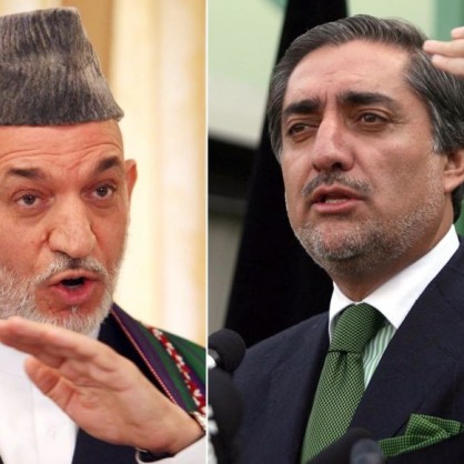 Хамид Карзай и съперникът му за президентския пост в Афганистан Абдула Абдула