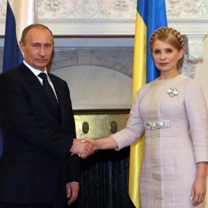 Владимир Путин и Юлия Тимошенко преговарят