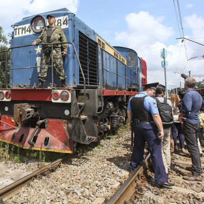 Влакът с хладилни вагони, пренасящ телата на жертвите от самолетната катастрофа в Източна Украйна