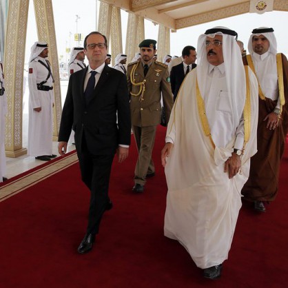 Френският президент Франсоа Оланд и емирът на Катар шейх Тамим бин Хамад Ал Тани