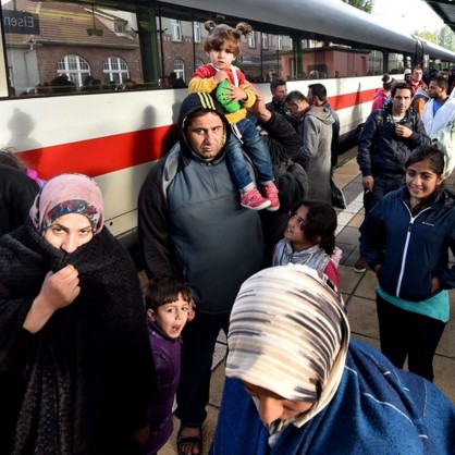 Бежаци, пристигнали в Германия